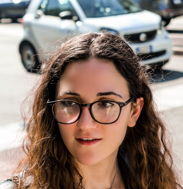 Woman wearing glasses street portrait